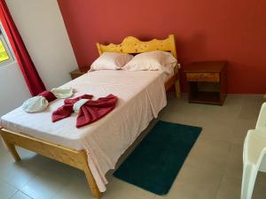 Un pat sau paturi într-o cameră la Casa Ze & sonia