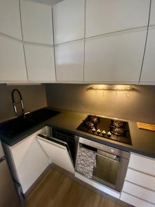 Una cocina o zona de cocina en Modern apartment with terrace and mezzanine floor