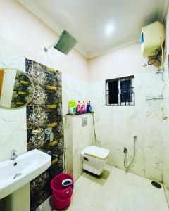 Ванна кімната в The Q3 Inn