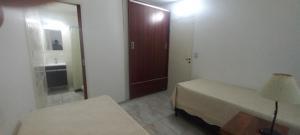 En eller flere senge i et værelse på La Delia