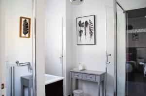 Koupelna v ubytování Hôtel Le Tivoli