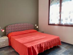 מיטה או מיטות בחדר ב-Appartamento Giulia