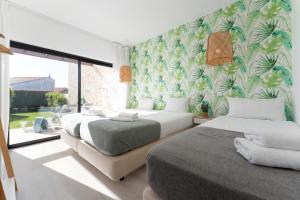 Postel nebo postele na pokoji v ubytování Casa Epic + 30 fotografií