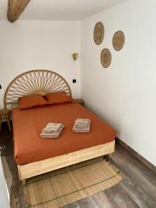 Llit o llits en una habitació de Le Limoni - Climatisé avec Patio privatif