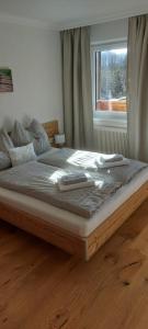 Un pat sau paturi într-o cameră la Schobermühle