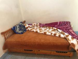 Postel nebo postele na pokoji v ubytování El houda beni mellal