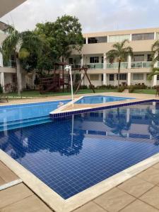 Bazén v ubytování GUARAJUBA-VILLAGE BELLA LUNA nebo v jeho okolí