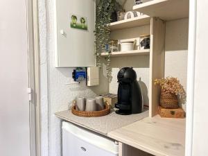 Kuchyň nebo kuchyňský kout v ubytování Apartamento ideal para parejas en Enveitg