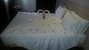 A bed or beds in a room at Hotel A44