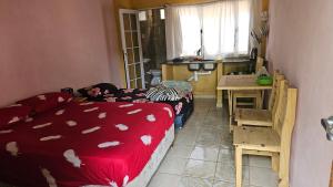 Kuchyň nebo kuchyňský kout v ubytování Hotel Los Chow Chow
