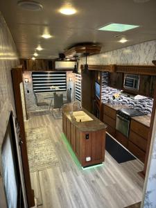 an interior view of an rv kitchen and living room at Green world zone in Calusa in Key Largo