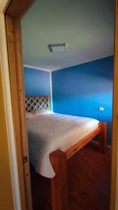 Postel nebo postele na pokoji v ubytování Cabaña entre rios