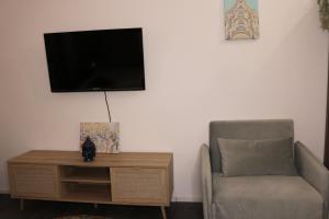 TV a/nebo společenská místnost v ubytování Philux City Apartment