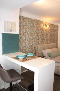 Posezení v ubytování Philux City Apartment