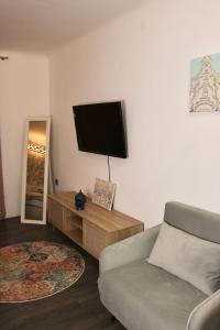 TV a/nebo společenská místnost v ubytování Philux City Apartment