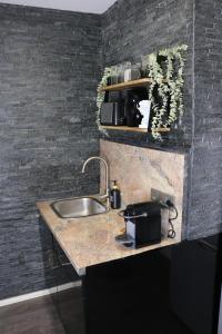 Kuchyň nebo kuchyňský kout v ubytování Philux City Apartment