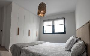 Postel nebo postele na pokoji v ubytování VV El Descanso