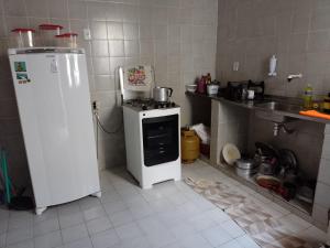 Kuchyň nebo kuchyňský kout v ubytování Casa de Guinho