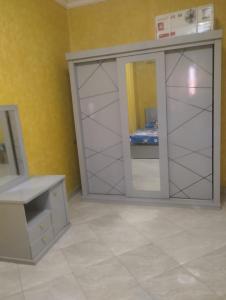Ett badrum på شقه ٢٦٠م شارع جامعة الدول العربية الرئيسي