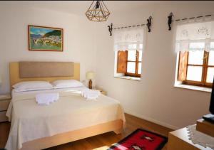 Ένα ή περισσότερα κρεβάτια σε δωμάτιο στο Hotel Borklad