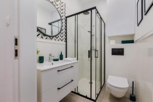 Kúpeľňa v ubytovaní Gdansk Apartments + 12 fotografií
