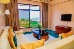 TV a/nebo společenská místnost v ubytování Luwa Evergreen Hotel