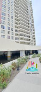 a large apartment building with a large building at NUEVO E IMPECABLE A PASOS DEL MAR in Antofagasta