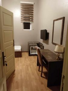 TV a/nebo společenská místnost v ubytování soprano guest house