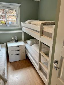 Postel nebo postele na pokoji v ubytování Basstuvåga ferieleilighet, Søgne i Kristiansand