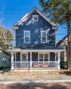 a blue house with a white porch at Downtown Wilmington Home ~ Pet Friendly in Wilmington +68 photos