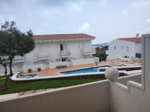 a view of a house with a swimming pool at Des Artistes Son Parc in Son Parc