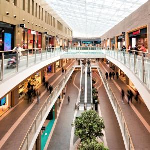 an overhead view of a shopping mall with people at Station 64 B2 Charleroi-Airport in Charleroi