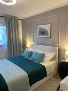 Postel nebo postele na pokoji v ubytování Apartman “Gušt”