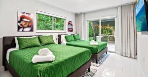 Ένα ή περισσότερα κρεβάτια σε δωμάτιο στο Miami's Exclusive Lagoon Villa +31 φωτογραφίες