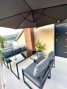 Χώρος καθιστικού στο Top Floor Apartment in Slano