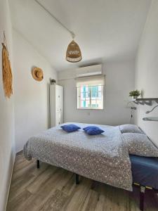 Кровать или кровати в номере Casa Albufeira