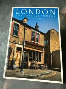 a book of london for interviewements with a building at Campania & Jones House in London