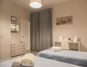 Postel nebo postele na pokoji v ubytování europa bed