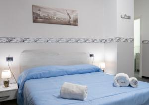 Postel nebo postele na pokoji v ubytování europa bed