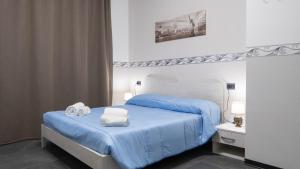 Postel nebo postele na pokoji v ubytování europa bed