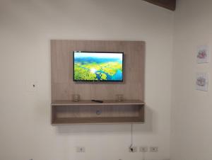 TV a/nebo společenská místnost v ubytování Apart Mdz