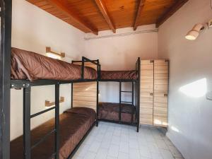 Hostel Falucho客房内的一张或多张床位