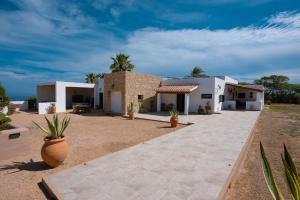 a villa with a view of the ocean at Casa Rural Can Blaiet in La Mola