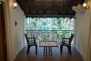 Balkón nebo terasa v ubytování The Cocario + 16 fotografií