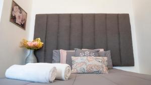 Postel nebo postele na pokoji v ubytování Rowy's appartement