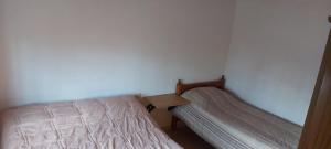 Postel nebo postele na pokoji v ubytování Cuarta División Apartment