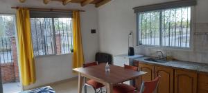 Kuchyň nebo kuchyňský kout v ubytování Cuarta División Apartment