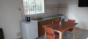 Kuchyň nebo kuchyňský kout v ubytování Cuarta División Apartment + 1 fotografie