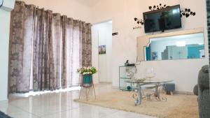 TV a/nebo společenská místnost v ubytování Rowy's appartement