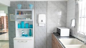 Kuchyň nebo kuchyňský kout v ubytování Rowy's appartement + 31 fotografií